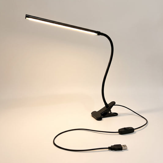 PiecePause clip-on LED puzzle light with flexible arm, USB cable and inline switch